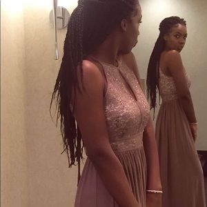 It is a tan kinda light brownish dress